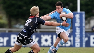 Lorcan Bourke tries to evade Ballymena's Luke Marshall