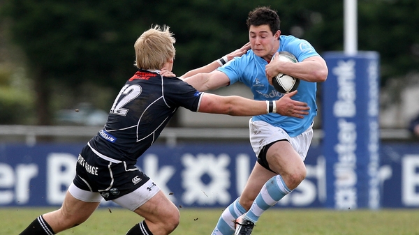 Lorcan Bourke tries to evade Ballymena's Luke Marshall