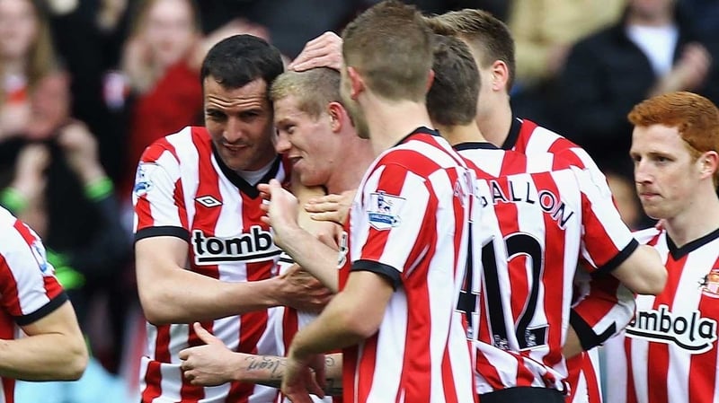 John O'Shea hugs goalscorer James McClean as Sunderland took the lead but Bolton fought back for a point