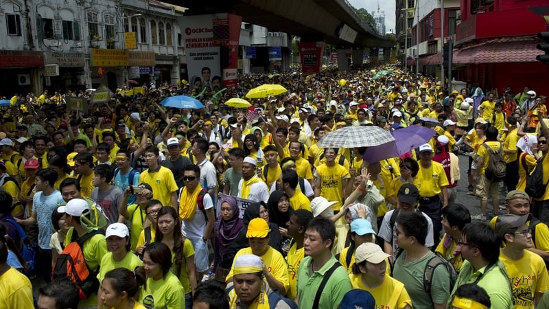 Protesters call for the implementation of long-promised reform