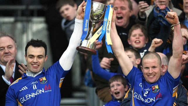 Longford captain Paul Barden and Dermot Brady (right) hoist the Division 3 cup after the win against Wexford
