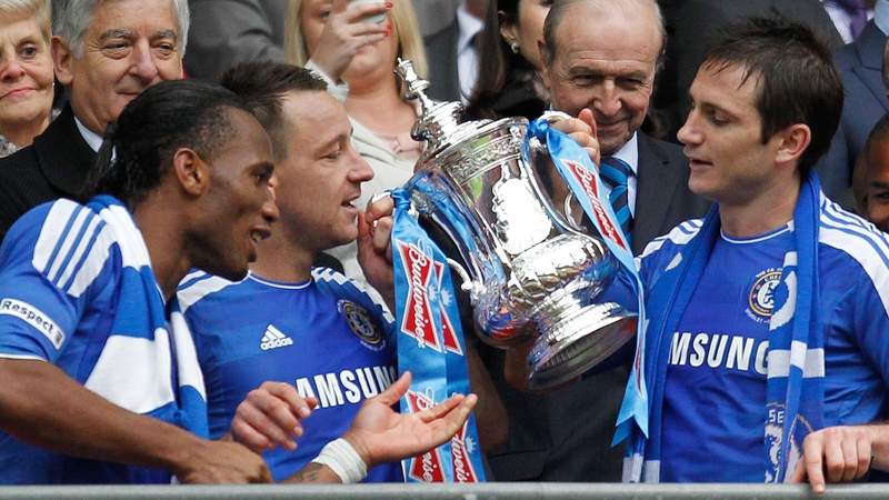 Didier Drogba, John Terry and Frank Lampard admire the FA Cup after Chelsea's fourth success in the competition in six years