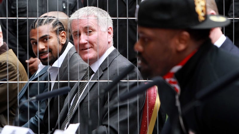 Cage fighters - David Haye (L) and Dereck Chisora (R) were seperated by a barrier for the announcement of the bout