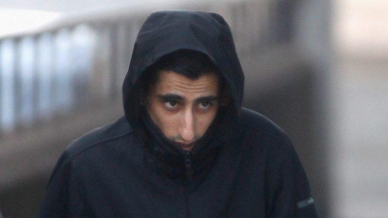 Kabeer Hassan, one of the nine men found guilty, arrives at Liverpool Crown Court in February