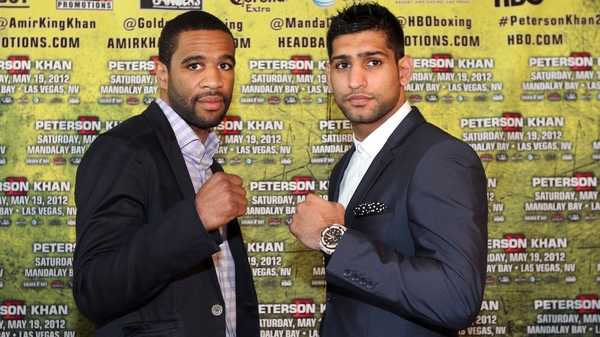 Lamont Peterson (l) and Amir Khan expect to find out today whether or not their 19 May rematch will go ahead