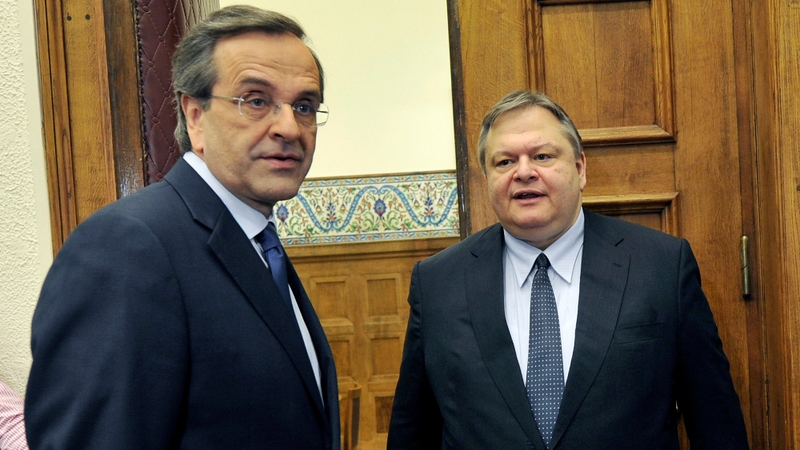 Leader of the New Democracy conservatives Antonis Samaras (L) meets socialist party leader Evangelos Venizelos at the Greek Parliament