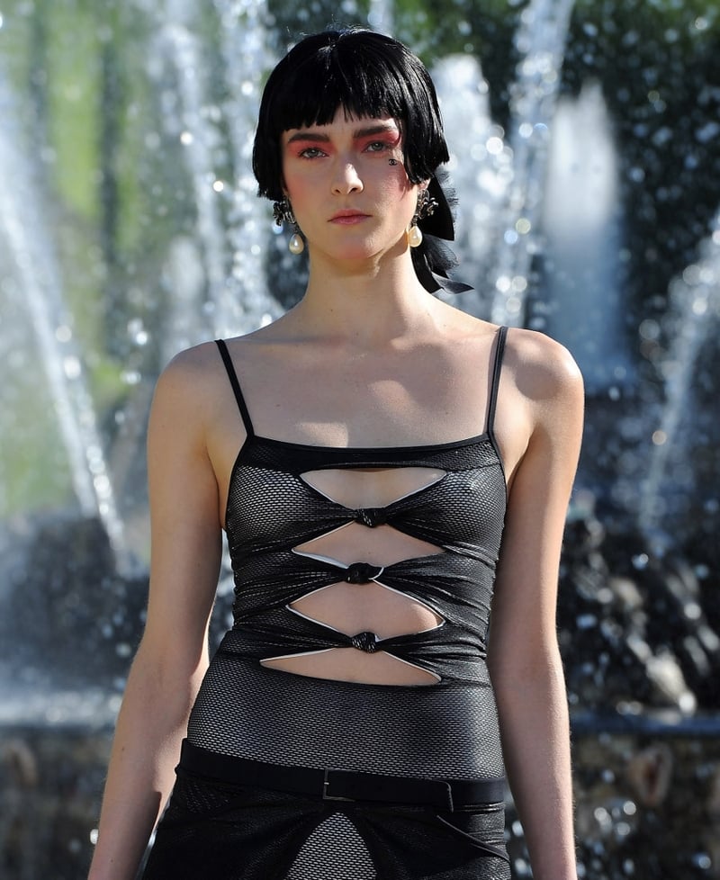 Ultra-modern and slinky swimwear was included in a covered-up collection