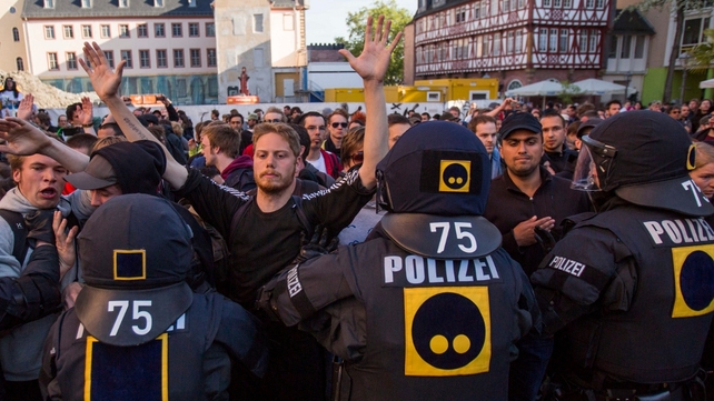German riot police wrangle with protesters during an unauthorised rally as part in the Blockupy protests in Frankfurt, Germany