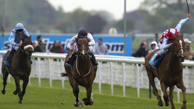 Tom McLaughlin on Red Cadeaux (r) pull clear to win the Yorkshire Cup