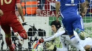 Petr Cech gets down to save Robben's penalty in extra time