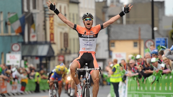 Marcin Bialoblocki holds his arms as he grabs victory on the opening day