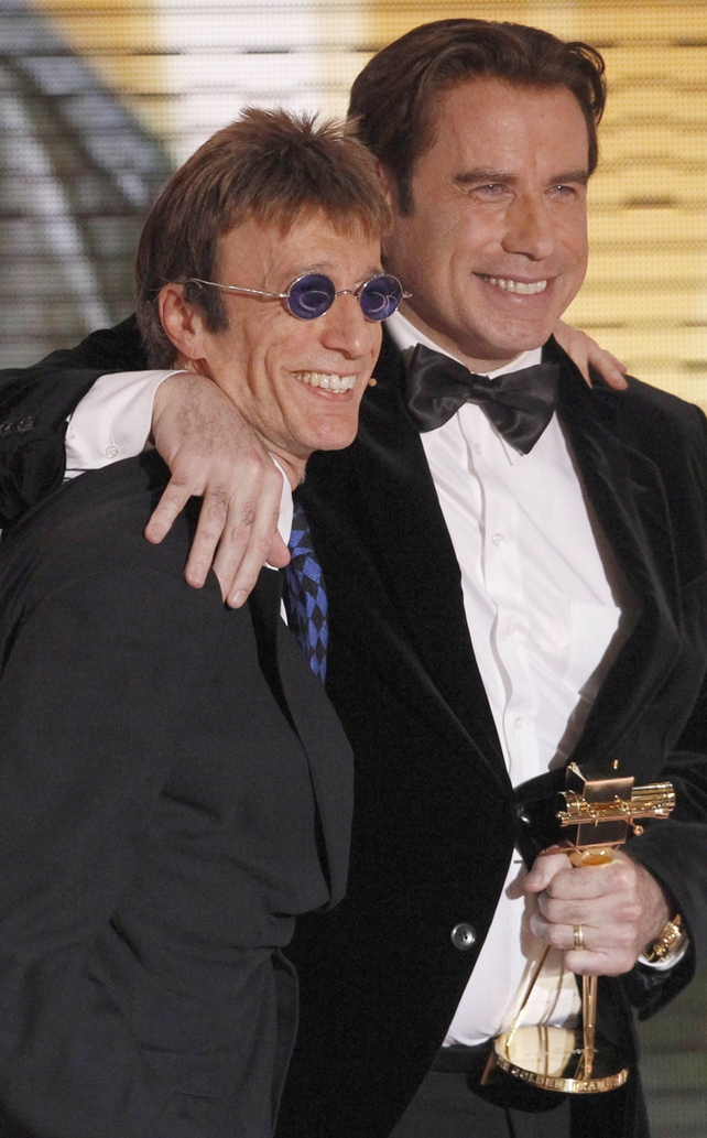 With John Travolta in 2011