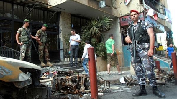 Lebanese security outside the offices of the pro-Syrian Arab Movement Party in Beirut following weekend clashes