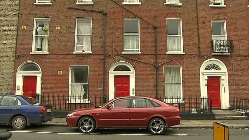 Mary Ryan was found with serious injuries at her home on Sherrard Street