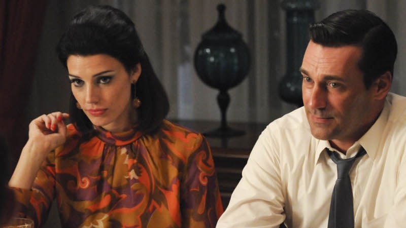 Megan (Jessica Paré) and Don (Jon Hamm) are off to Hawaii for Christmas on Mad Men