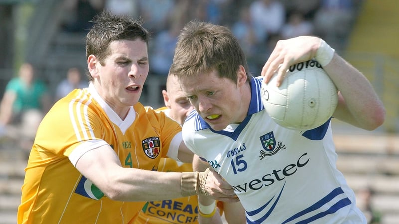 Conor McManus of Monaghan battles with Kevin O'Boyle of Antrim