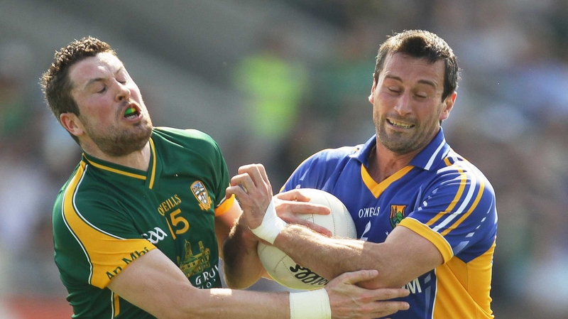 Meath's Cian Ward tackles Ciaran Hyland of Wicklow