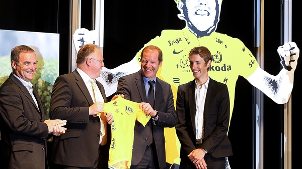 Andy Schleck (r) being presented with the 2010 Yellow Jersey in his home town of Mondorf-les-Bains on Tuesday