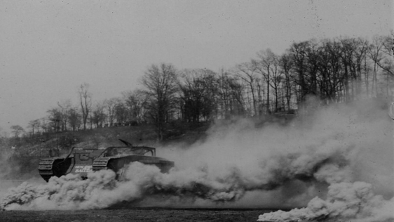 British tank moves through a smokescreen.