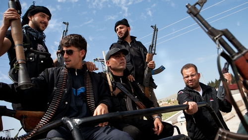Rebels and the Syrian government have blamed each other for last week's massacre
