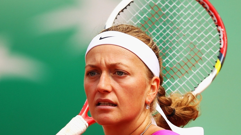 Petra Kvitova remains on course for a possible quarter-final meeting with Li Na