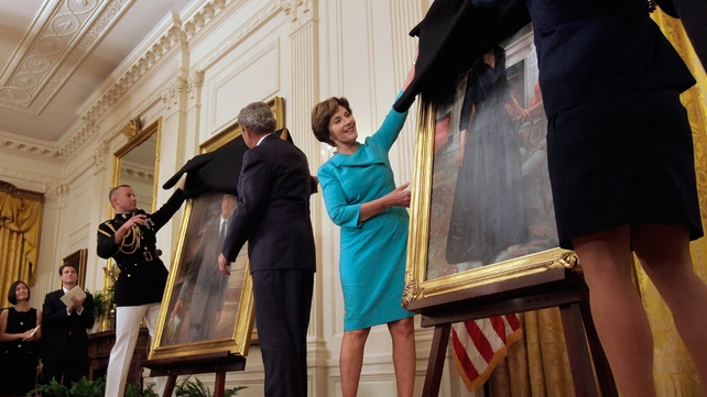 George W Bush and his wife Laura return to the White House to unveil their official portraits