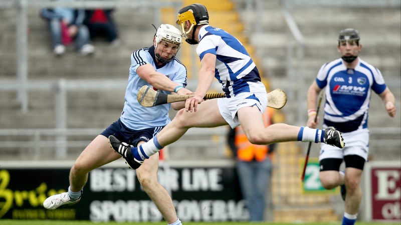 Liam Rushe scores Dublin's second goal despite the attentions of Gearoid Burke