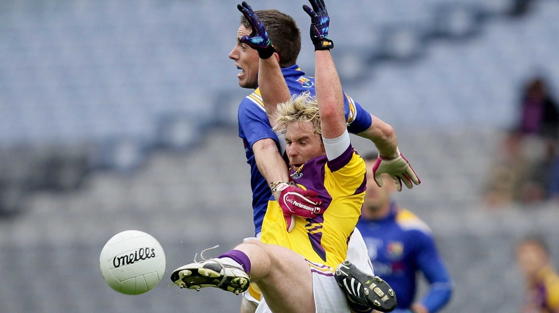 Wexford's Ben Brosnan and Colm P Smyth of Longford