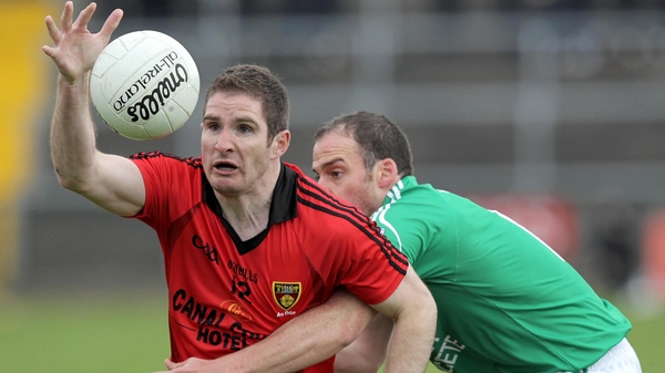 Fermanagh's Brian Og Maguire with Down's Aidan Carr