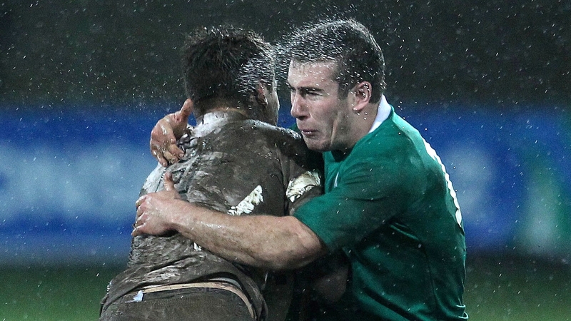 Ireland's JJ Hanrahan tackles Jack Clifford