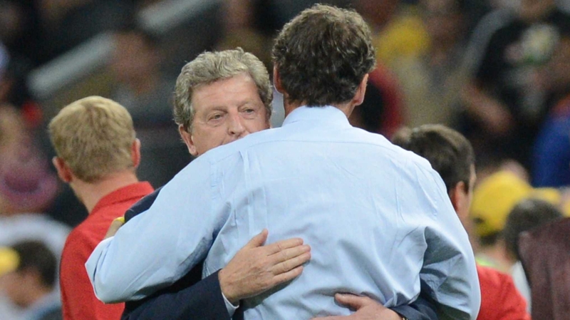 Roy Hodgson hugs France coach Laurent Blanc. 'The longer we play together, the better we'll become too,' said Hodgson after the game