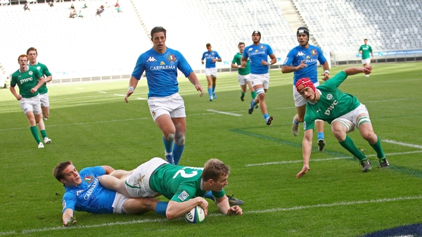 Chris O'Farrell goes over for an Irish try