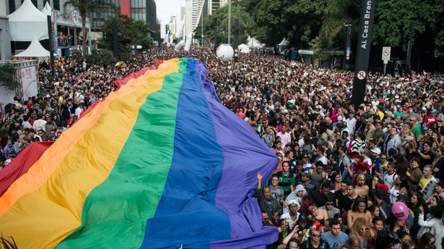 A huge rainbow flag unfolds during the annual Gay Pride Parade in Sao Paulo, Brazil