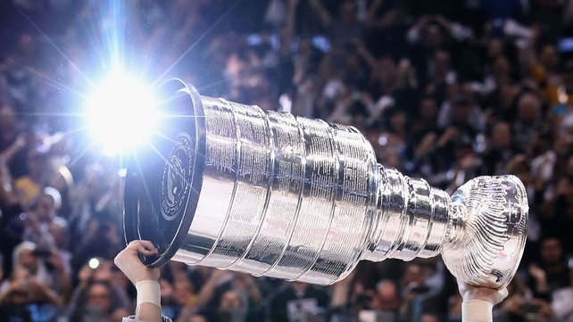 The Los Angeles Kings hoists the Stanley Cup after defeating the New Jersey Devils