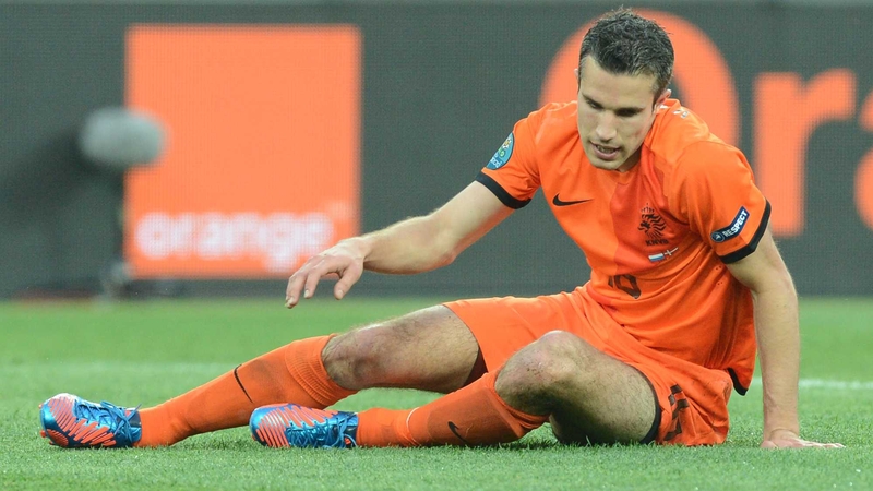 Down and (almost) out - Robin van Persie and his Dutch team-mates seem certain to suffer a premature ejection from Euro 2012