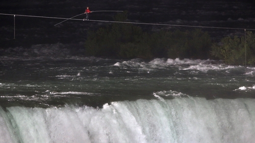 Aerialist Nik Wallenda walks over the Niagara Falls
