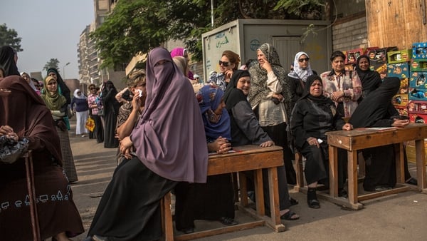 Egyptian women line up to cast their vote