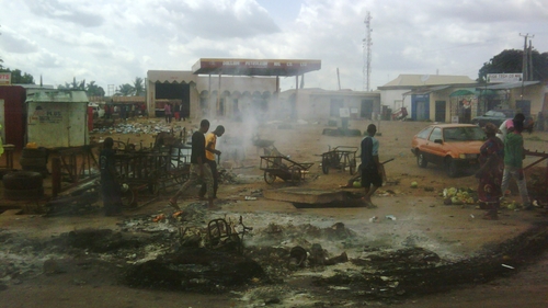 A gas station burned in retaliation after the bomb attacks