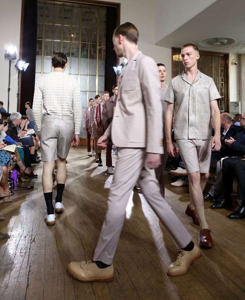Models walk during the finale of Nicole Farhi Mens SS13 at London Collections: Men