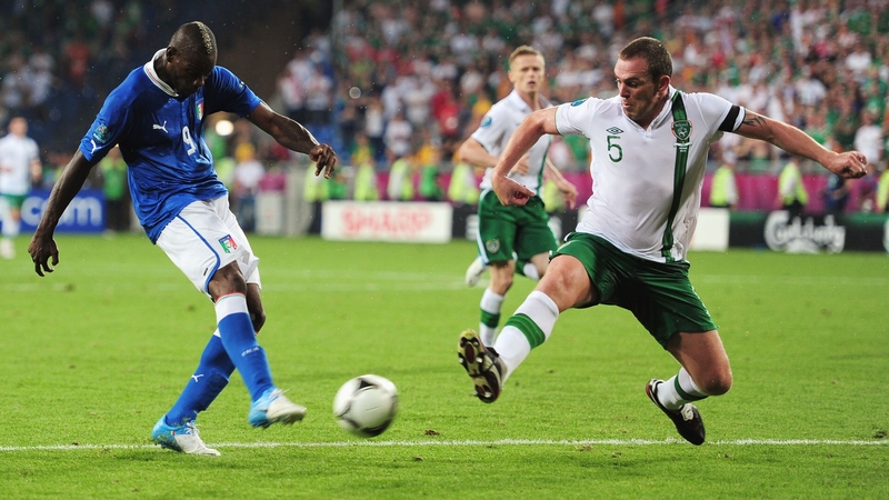Richard Dunne blocks a Mario Balotelli effort during the European Championships