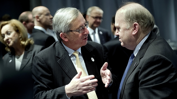 Michael Noonan, pictured with Jean Claude Juncker, announced the change in European Investment Bank's rules after today's ECOFIN meeting
