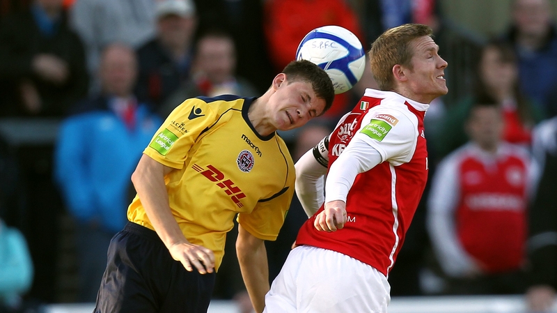 Luke Byrne (l) of Bohemians and Conor Kenna of St Patrick's Athletic in an aerial battle at Richmond Park