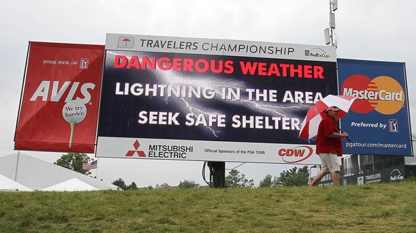 Jacobsen leads rain-delayed Travelers