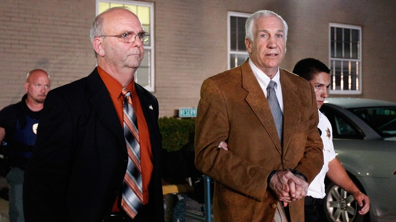 Jerry Sandusky (right) was found guilty of abusing ten boys over a 15-year period