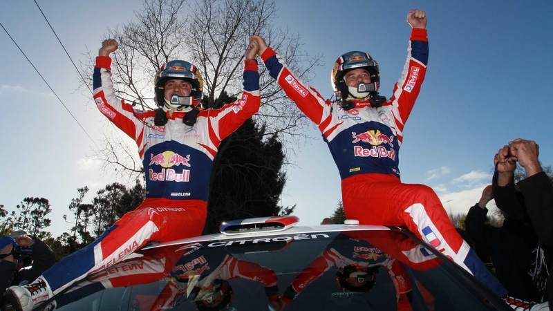 Sebastian Loeb of France (R) and co driver Daniel Elena