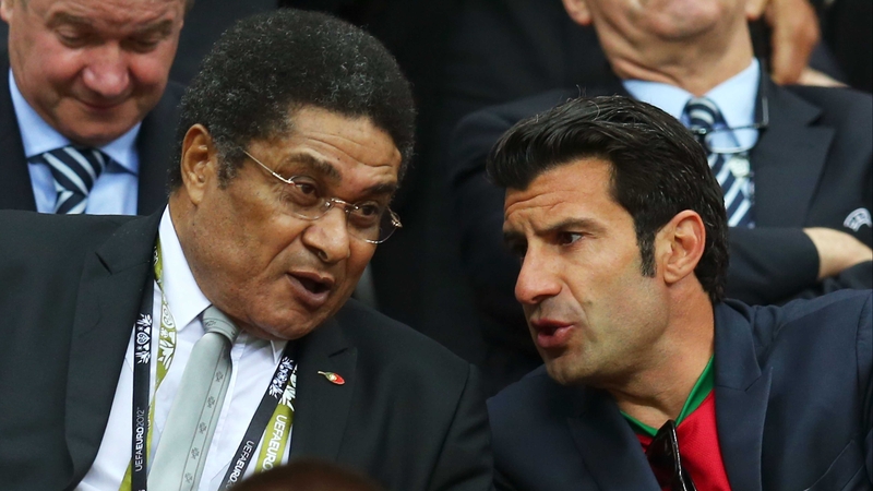 Eusebio (L) pictured here with Luis Figo