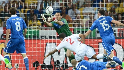Gianluigi Buffon pulled off a magnificent early save from Glen Johnson