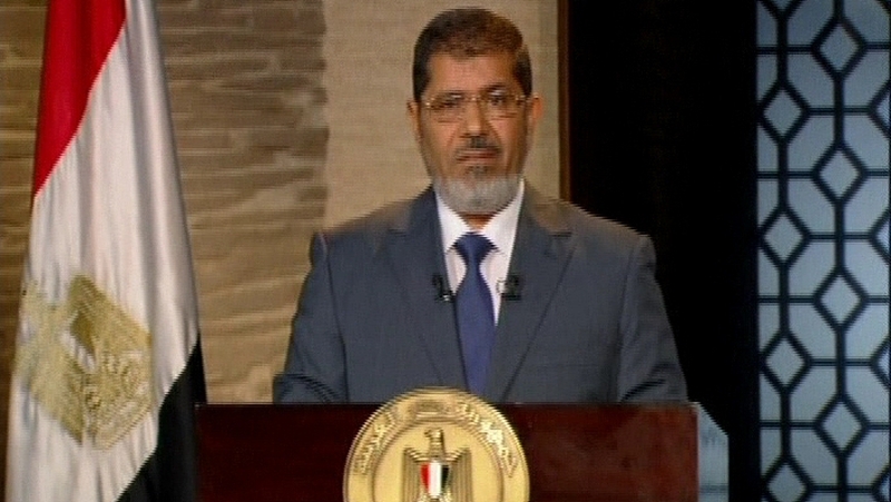Mohammed Mursi has said he will respect international treaties
