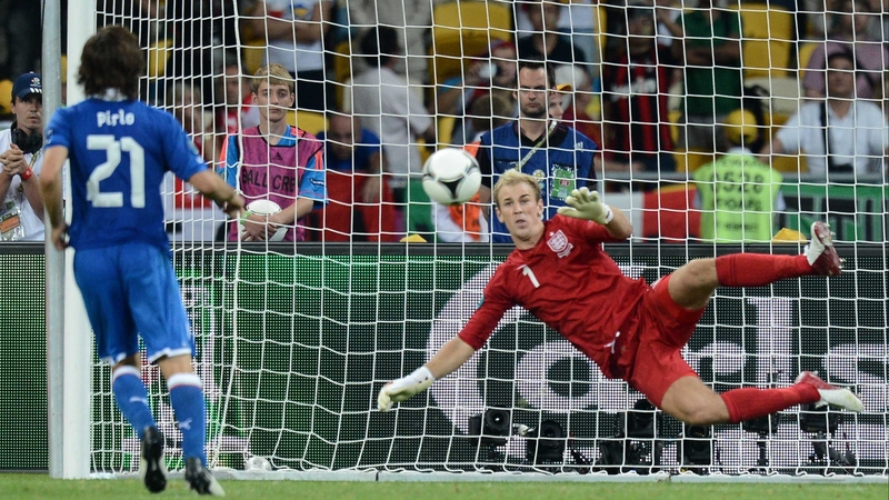 Joe Hart dives to his right as Andrea Pirlo clips the ball down the middle