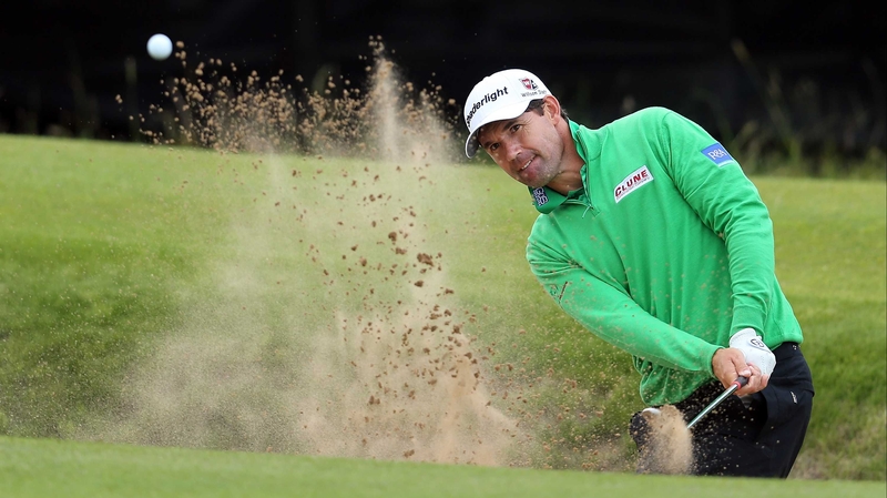 Padraig Harrington hits out of a bunker during his practice round in Portrush